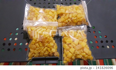 A snack made from cassava cut into small cubes. A snack made from cassava cut into small cubes. 141826096