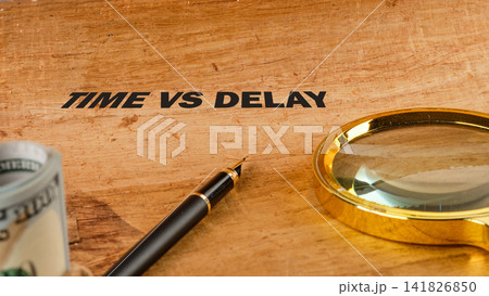 The scene shows a wooden surface with the words time vs delay. There is a pen and a magnifying glass nearby, suggesting a task or decision making The scene shows a wooden surface with the words time vs delay. There is a pen and a magnifying glass nearby, suggesting a task or decision making 141826850