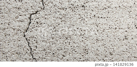 Surface texture of cracked porous concrete 141829136