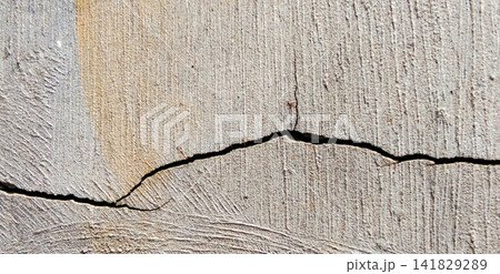 Stained and cracked concrete plaster walls Stained and cracked concrete plaster walls 141829289