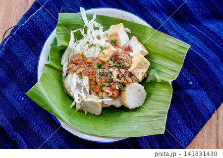 Traditional Indonesian Tahu Campur with Tofu Lontong Peanut Sauce Cabbage Traditional Indonesian Tahu Campur with Tofu Lontong Peanut Sauce Cabbage 141831430