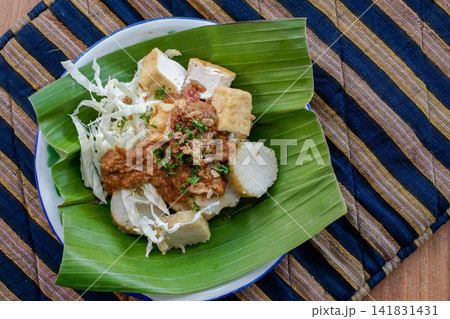 Traditional Indonesian Tahu Campur with Tofu Lontong Peanut Sauce Cabbage 141831431