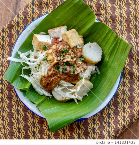 Traditional Indonesian Tahu Campur with Tofu Lontong Peanut Sauce Cabbage Traditional Indonesian Tahu Campur with Tofu Lontong Peanut Sauce Cabbage 141831435