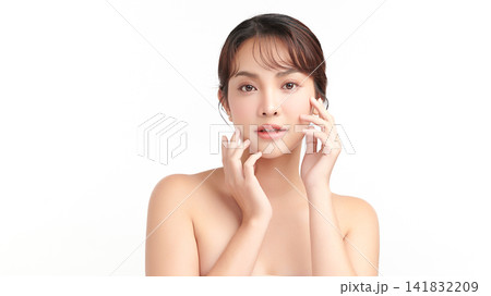 A beautiful young Asian woman with clean, fresh skin against a white background. Skincare, facial treatment, cosmetology, beauty, and spa. An elegant portrait of an Asian woman. A beautiful young Asian woman with clean, fresh skin against a white background. Skincare, facial treatment, cosmetology, beauty, and spa. An elegant portrait of an Asian woman. 141832209