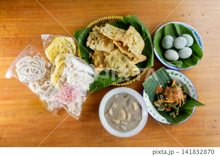 Traditional Indonesian Food Assortment Served on Banana Leaves Traditional Indonesian Food Assortment Served on Banana Leaves 141832870