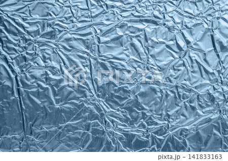 Shiny metallic blue foil crumpled texture background 141833163