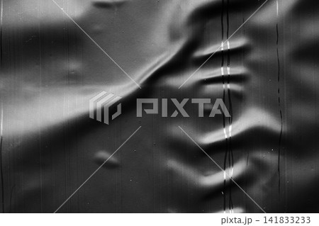 transparent plastic bag wrap overlay texture on black background transparent plastic bag wrap overlay texture on black background 141833233
