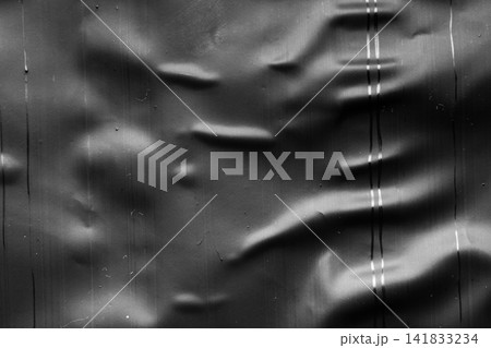 transparent plastic bag wrap overlay texture on black background transparent plastic bag wrap overlay texture on black background 141833234