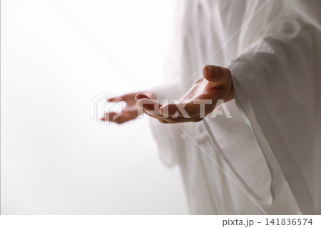 God's merciful hand giving love, hope, and peace, the resurrection of Jesus Christ and Easter background God's merciful hand giving love, hope, and peace, the resurrection of Jesus Christ and Easter background 141836574