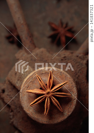 Anise on a rusty background. Anise on a rusty background. 141837321