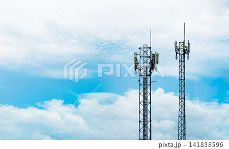 Telecommunication tower with blue sky and white clouds. Antenna on blue sky. Radio and satellite pole. Communication technology. Telecommunication industry. Mobile or telecom 4g network. Technology 141838596