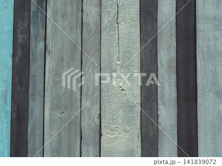 Weathered blue grey wooden plank wall texture with natural grain, aged painted timber surface and rustic vertical boards for background, architecture, interior design and copy space. Weathered blue grey wooden plank wall texture with natural grain, aged painted timber surface and rustic vertical boards for background, architecture, interior design and copy space. 141839072