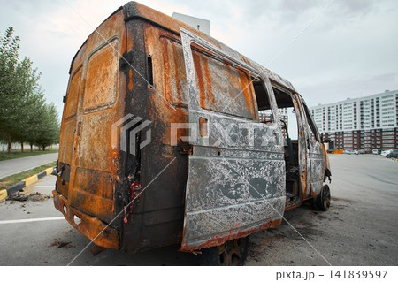 Rusty Flaking Metal Body Panel of a Burnt Out Vehicle Rusty Flaking Metal Body Panel of a Burnt Out Vehicle 141839597
