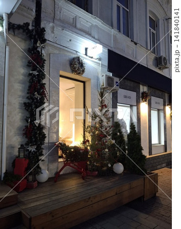 Christmas decoration on the door of a shop. Christmas decoration on the door of a shop. 141840141