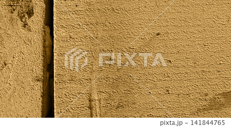 Golden Yellow Rough Stucco Wall Texture with Vertical Seam 141844765