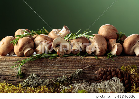 Mushrooms on a old wooden board. Mushrooms on a old wooden board. 141846636
