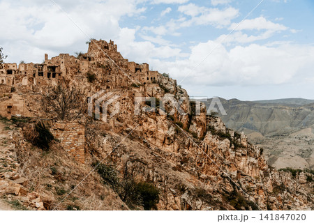 Aul Gamsutl fortress old town, old stone landmark architecture, Dagestan, Russia 141847020
