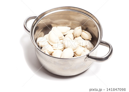 vareniki with potatoes in a saucepan isolated on white background vareniki with potatoes in a saucepan isolated on white background 141847098