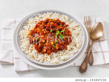 Picadillo Vegetariano con Frijoles on a plate Picadillo Vegetariano con Frijoles on a plate 141847216
