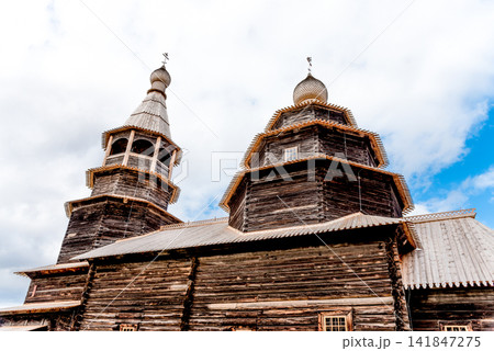 Old traditional Russian wooden cobblestone Orthodox christianity church temple Old traditional Russian wooden cobblestone Orthodox christianity church temple 141847275