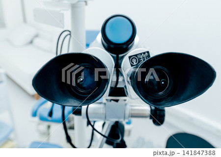 Colposcopy machine in bright gynecologist office background gynecological chair 141847388
