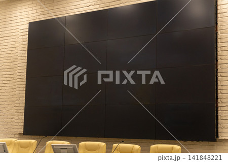 A large blank black video wall of multiple display panels A large blank black video wall of multiple display panels 141848221