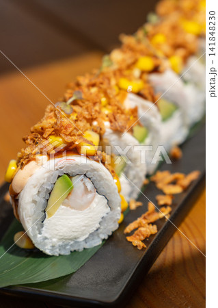 Close-up of sushi rolls with shrimp, avocado and cream cheese Close-up of sushi rolls with shrimp, avocado and cream cheese 141848230