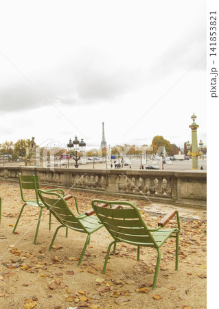 Green park chairs in Tuileries Garden with Eiffel Tower view, autumn Paris travel background with copy space Green park chairs in Tuileries Garden with Eiffel Tower view, autumn Paris travel background with copy space 141853821