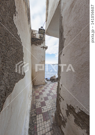 Narrow old street lane opening to Mediterranean Sea in Villajoyosa Spain with copy space Narrow old street lane opening to Mediterranean Sea in Villajoyosa Spain with copy space 141856687