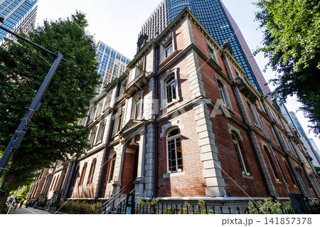 Low-angle view of the Mitsubishi Ichigokan Museum in Marunouchi, Chiyoda, Tokyo, Japan. The museum focuses on 19th-century Western artwork. Low-angle view of the Mitsubishi Ichigokan Museum in Marunouchi, Chiyoda, Tokyo, Japan. The museum focuses on 19th-century Western artwork. 141857378