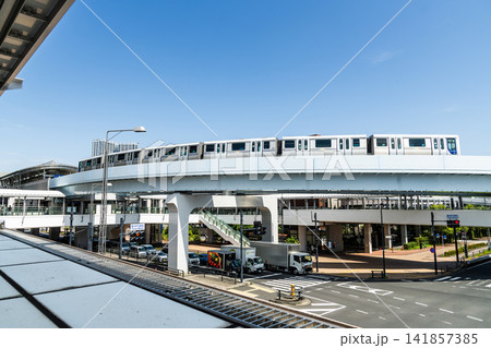 View of a New Transit Yurikamome line train running on the elevated track in Koto, Tokyo, Japan. It's an automated guideway transit service in Tokyo. View of a New Transit Yurikamome line train running on the elevated track in Koto, Tokyo, Japan. It's an automated guideway transit service in Tokyo. 141857385