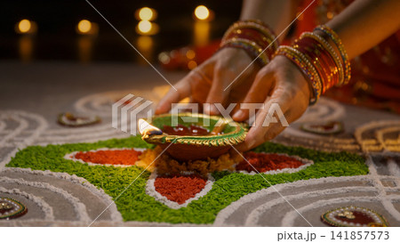 Clay diya lamps lit during diwali celebration, Diwali, or Deepavali, is India's biggest and most important holiday. Clay diya lamps lit during diwali celebration, Diwali, or Deepavali, is India's biggest and most important holiday. 141857573