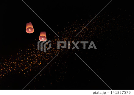 Enchanting Sky Lanterns in Yi-Peng Festival, Chiang Mai Thailand. Enchanting Sky Lanterns in Yi-Peng Festival, Chiang Mai Thailand. 141857579