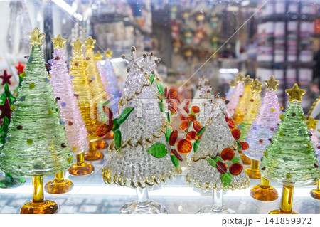 The glass-blown Christmas figurines made of Murano glass The glass-blown Christmas figurines made of Murano glass 141859972