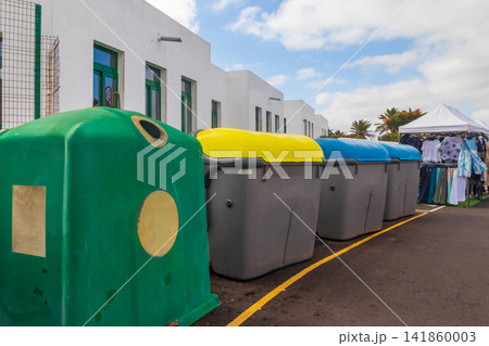 Recycling bins for different waste types. Ecology concept of sustainable waste management Recycling bins for different waste types. Ecology concept of sustainable waste management 141860003