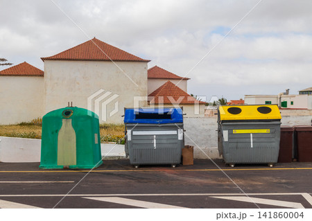 Recycling bins for different waste types. Ecology concept of sustainable waste management Recycling bins for different waste types. Ecology concept of sustainable waste management 141860004