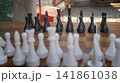 Perspective View Across Outdoor Chessboard Facing Black Team 141861038
