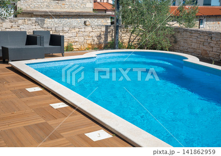 Luxury outdoor swimming pool. Luxury outdoor swimming pool. 141862959