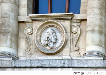 Ancient bas-reliefs on the Windows and walls of historical buildings Ancient bas-reliefs on the Windows and walls of historical buildings 141863199