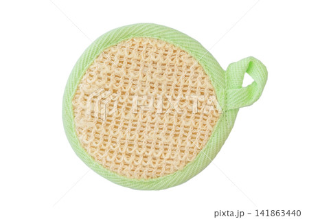 Natural loofah sponge. Care and hygiene. Top view. Face wash sponge. Mockup in isolated on white background. Natural loofah sponge. Care and hygiene. Top view. Face wash sponge. Mockup in isolated on white background. 141863440