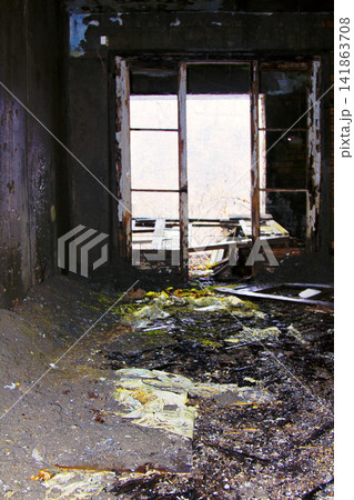 ruins of an old house with window light. 141863708