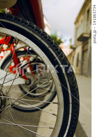standing bikes in the Parking lot standing bikes in the Parking lot 141863734