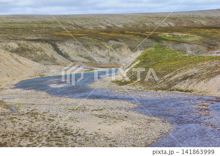 Scarce landscape of cold Arctic desert. Novaya Zemlya archipelago. Nuclear testing range 1 Scarce landscape of cold Arctic desert. Novaya Zemlya archipelago. Nuclear testing range 1 141863999