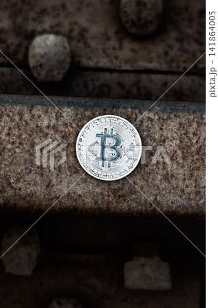 Bitcoin (silver coin) on different backgrounds Bitcoin (silver coin) on different backgrounds 141864005