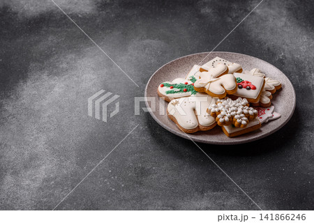 Gingerbread as a Christmas staple, sweet biscuits for the holiday table. Gingerbread as a backdrop Gingerbread as a Christmas staple, sweet biscuits for the holiday table. Gingerbread as a backdrop 141866246