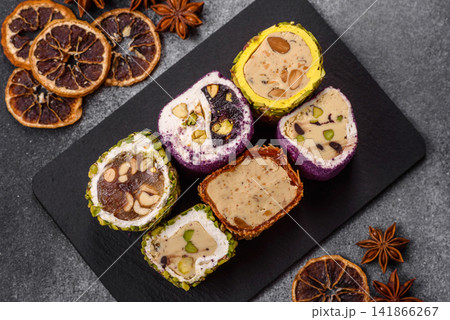Turkish delight or lokum is a traditional Eastern sweet made with nuts. Turkish delight, lokum Turkish delight or lokum is a traditional Eastern sweet made with nuts. Turkish delight, lokum 141866267