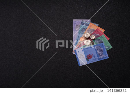 Malaysian ringgit banknotes as a tool for trade and financial transactions. The Malaysian ringgit Malaysian ringgit banknotes as a tool for trade and financial transactions. The Malaysian ringgit 141866281