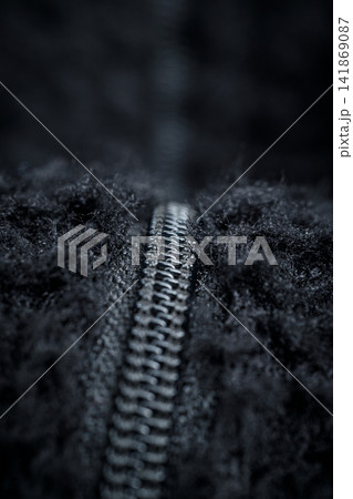 Zipper on black fleece background close-up 141869087