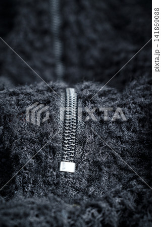 Zipper on black fleece background close-up Zipper on black fleece background close-up 141869088