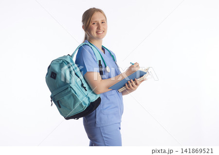 Nursing Student with Notebook Preparing for Clinicals 141869521